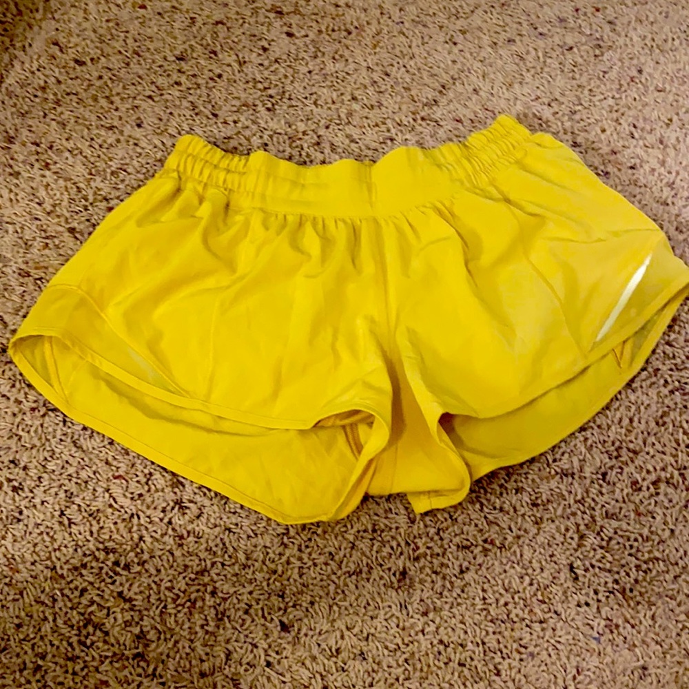 Yellow 2.5” Lululemon hotty hot shorts size 4